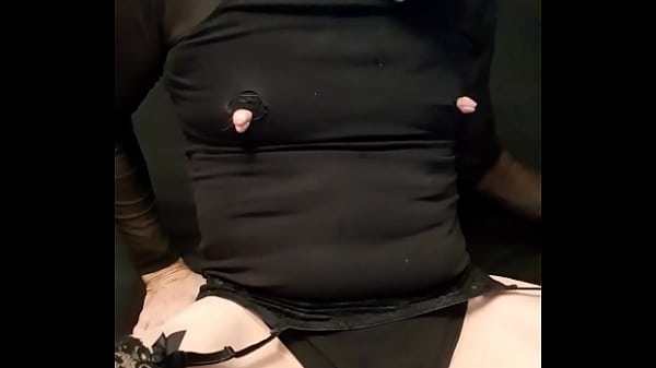 Extreme kinky crossdresser  with big nipples receiving remote estim 