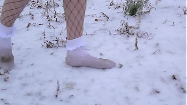 Walking in the snow and on ice wearing 4.5 inch high heel stilettos and white lace socks  