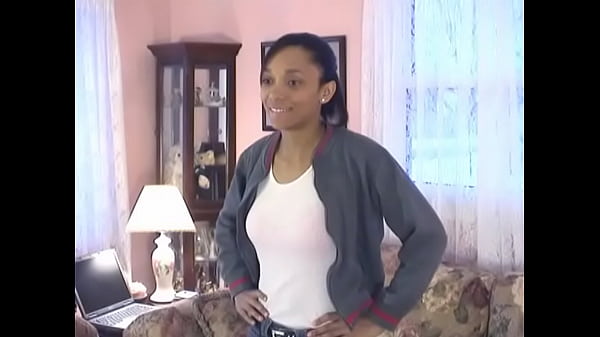 Cute little black chick shows off her skinny beautiful bod on a couch  