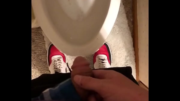 Male relives himself and plays with his cock afterwards  