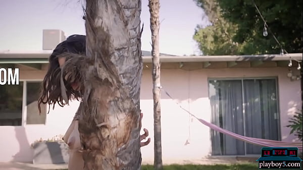 Busty and an amazing ass latina model gets naked in a garden and hammock