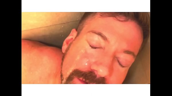 Urinal faggot gets face blasted with cum