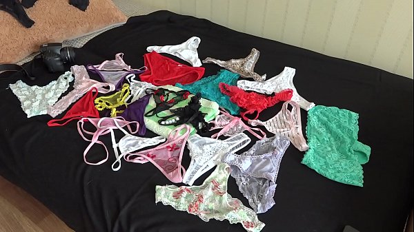 Overgrown cunt in a photo shoot trying little panties and in various poses shows juicy butt and legs in stockings.  