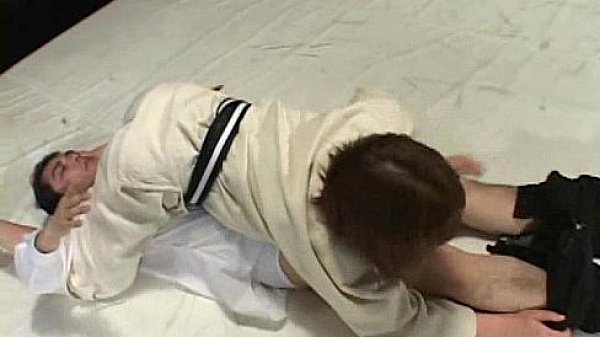 Mistress beats up gagged slave in wrestling match inside the ring