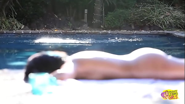 The individual with attractive dark hair has a fondness for engaging in oral stimulation of the female genitalia with her female partner subsequent to the latter's departure from the swimming pool.