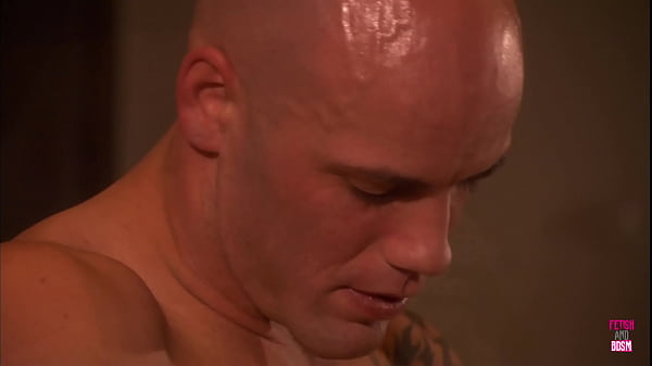 The attractive woman expresses intense pleasure as the bald man orally stimulates her hairless genital area