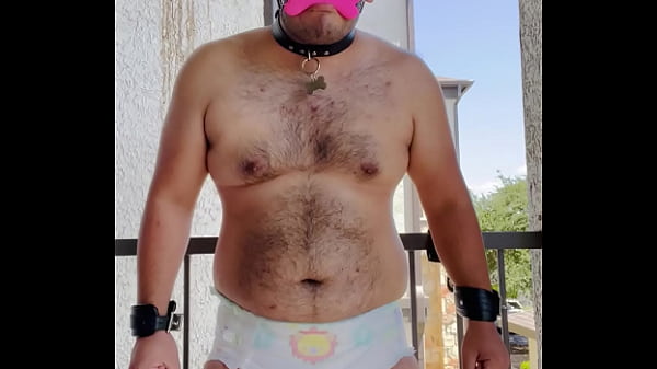 Diaper boy tied up to the balcony 