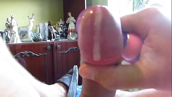 young guy jerks off a cock with a toy moans and cums