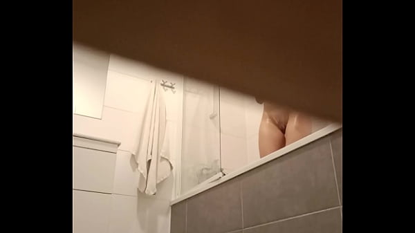 I let a girl living next door to take a shower at my apartment and secretly checked how is her pussy doing  