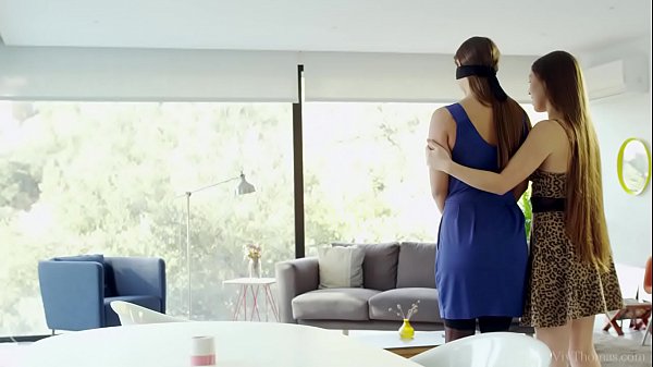 Horny lesbian babes having fun with a vibrating wand