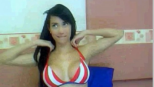 Busty brunette plays with small dildo  