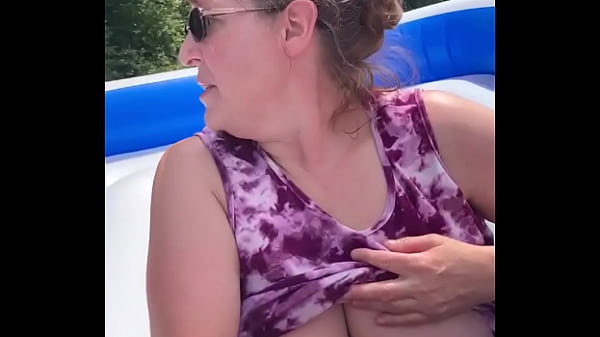 Milf plays with dick in public
