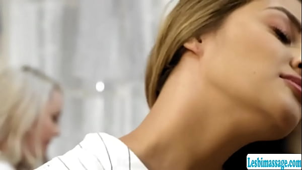 Busty blonde asks her new teen neighbor if she wants some free massage.She lets her get naked and start rubbing her warm body into hers.