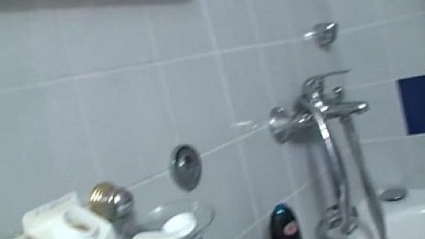 Nika takes a milky shower