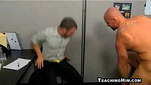 Hot muscular stud and his boss take turns sucking cock