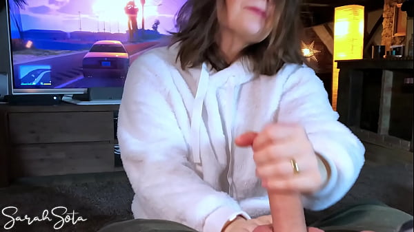 Cute girl in cosy sweater gives a blowjob while her boyfriend is g - handjob ending  