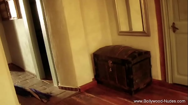 She seduce his man by stripteasing her dress and dancing the indian ritual. 