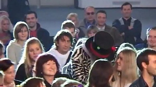 Hot brunette girl seduces the crowd