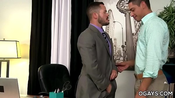 Latino stud takes a huge cock in the office