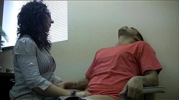Quietly giving man a quick masturbation in the office
