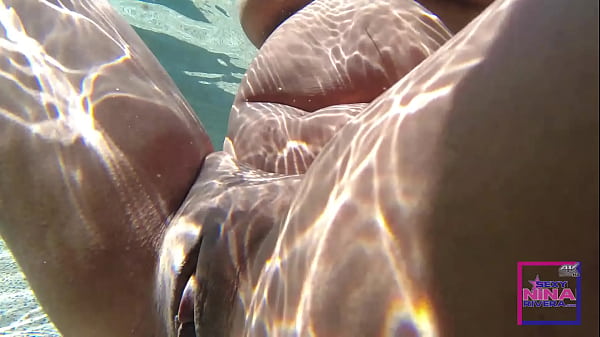 Interracial Lesbian in the pool 