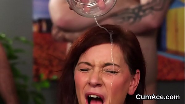 Nasty looker gets cumshot on her face swallowing all the love juice