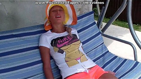 Real passion of teenage couple in the field of sunflowers