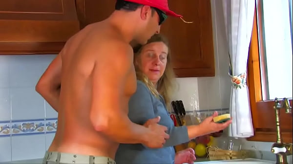 This milf likes to get her ass spanked while she sucks a nice cock