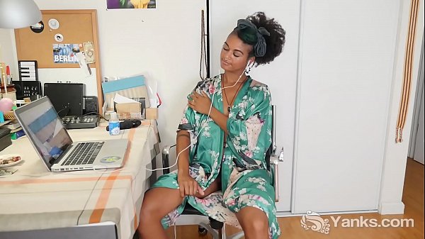 Tempting ebony babe from Yanks Lola Rose fingering her hairy pussy for orgasm while watching porn 