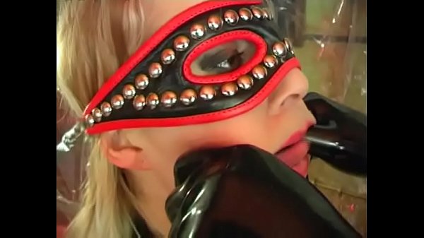 An unleashed slut in fetish dress ass fucked by a filth and aroused masked man 