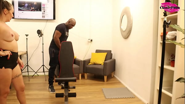 Black gym instructor on white woman's back e1 p1