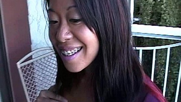 Asian Mame flashing huge boobs on a balcony in Canada