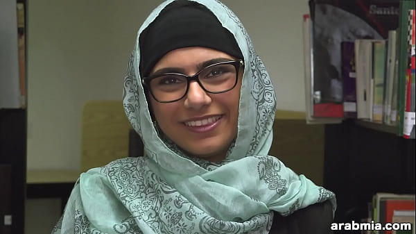 The cute and eccentric Mia Khalifa is in a library Playing With Herself