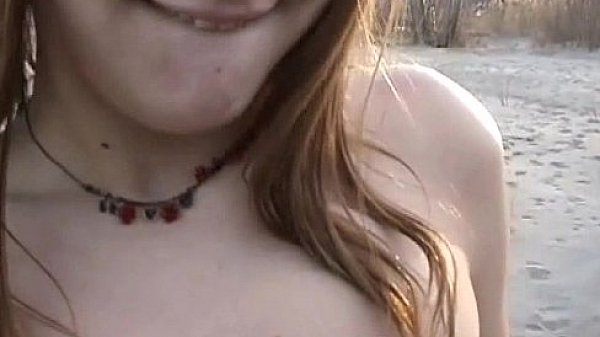 Teen flashing big boobs on windy beach