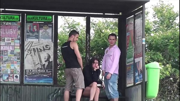 Extreme young busty woman fucked by 2 guys at a bus stop in the middle of a day