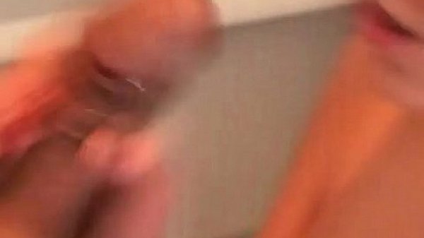 Big tits MILF gives footjob  