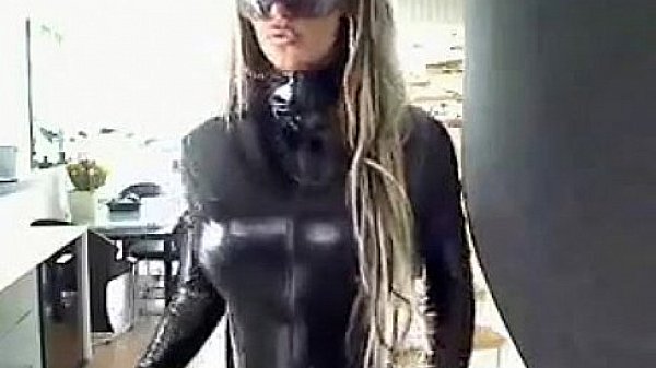 Busty reveals her tits on latex