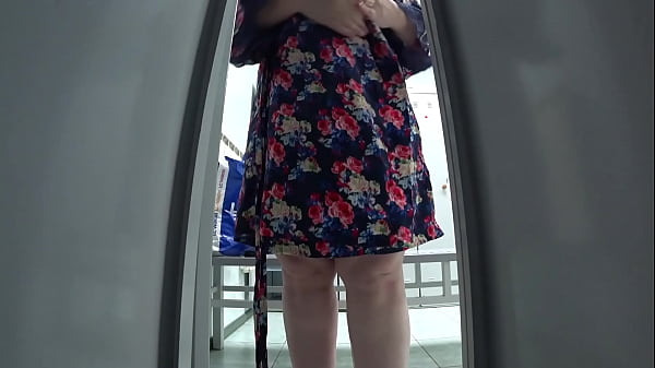 Hidden camera in a cubicle in a public locker room caught a fat mommy with an appetizing booty and saggy tits in her lens. Peeping.  