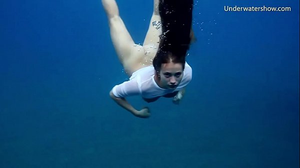 Underwater romantic nude swimming  