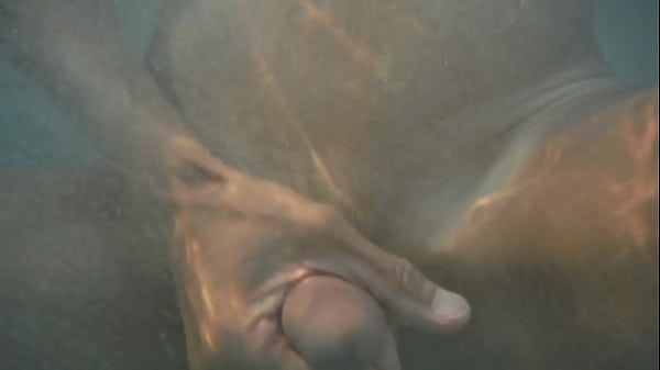 Stroking and jerking my cock in the water 