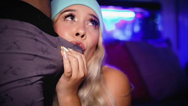 College girl with a cute face looks adorable playing with a cock