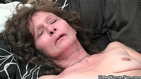 Saggy granny in stockings masturbates hairy pussy