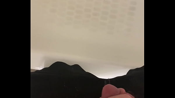 Pissing into the shower while holding my big sack 