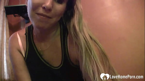 Blonde stripps slowly and shows her big boobs