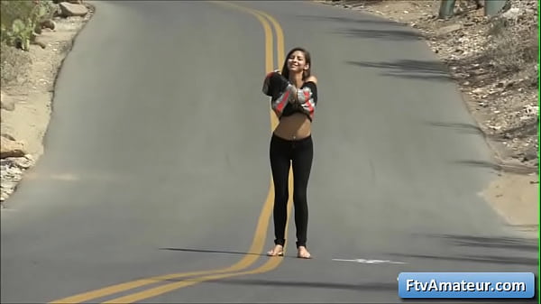 Watch naughty natural busty black haired cutie girl reveal her amazing huge boobs in public