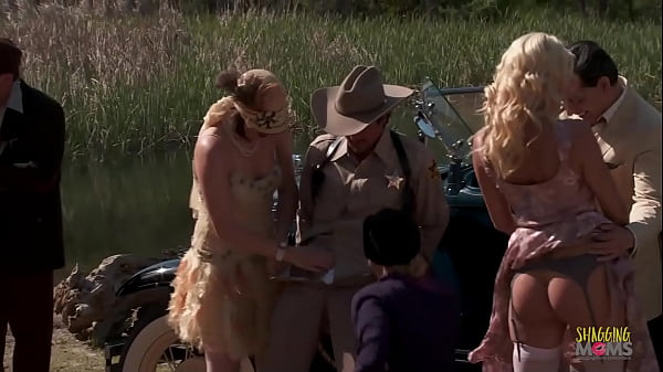 Copper tries to apprehend the thieves but he is outnumbered. As they tie him down, they decide to celebrate. The milfs gather around outside and eagerly await the men to ravage them during group sex. 