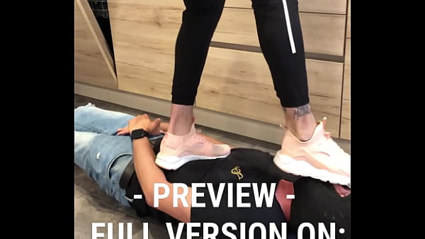 Trampling and jumping on the slave in hot sneakers  