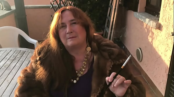 Slut dom with fur and holder outdoors  