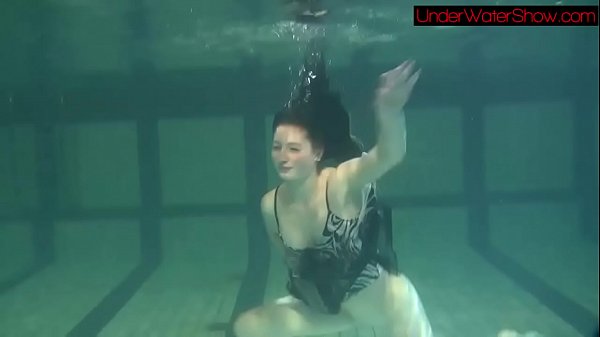 Blackhaired beauty Irina underwater