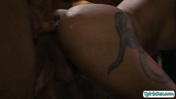 Masseuse Dillion Diaz leads busty latina Transsexual Eva Maxim in the massage where he lays her naked sexy shaped body then oils it to rub. 